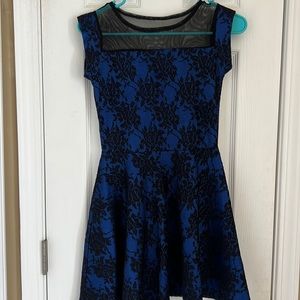 Girl’s blue and black dress
